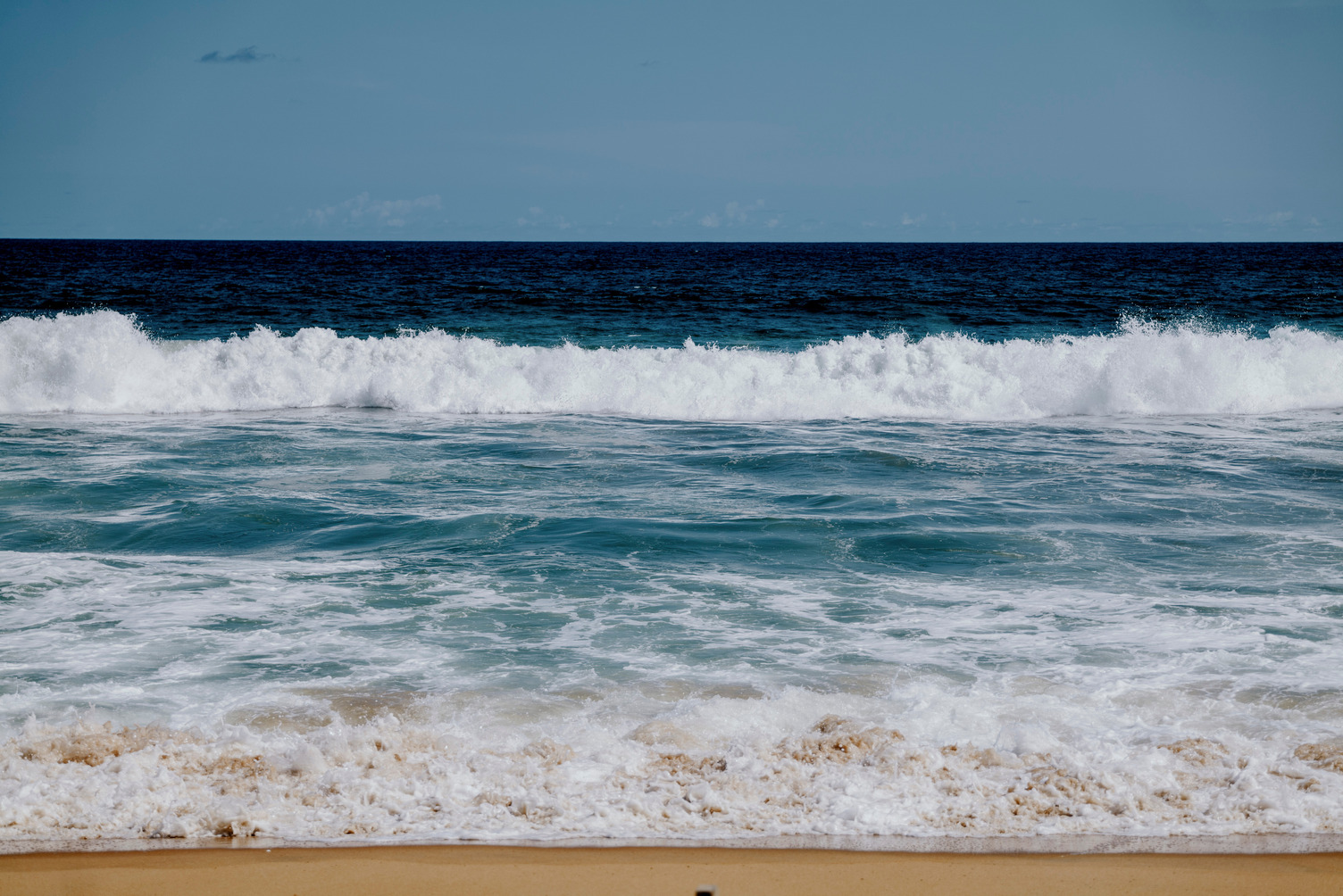 Oceanfront with waves and sand 