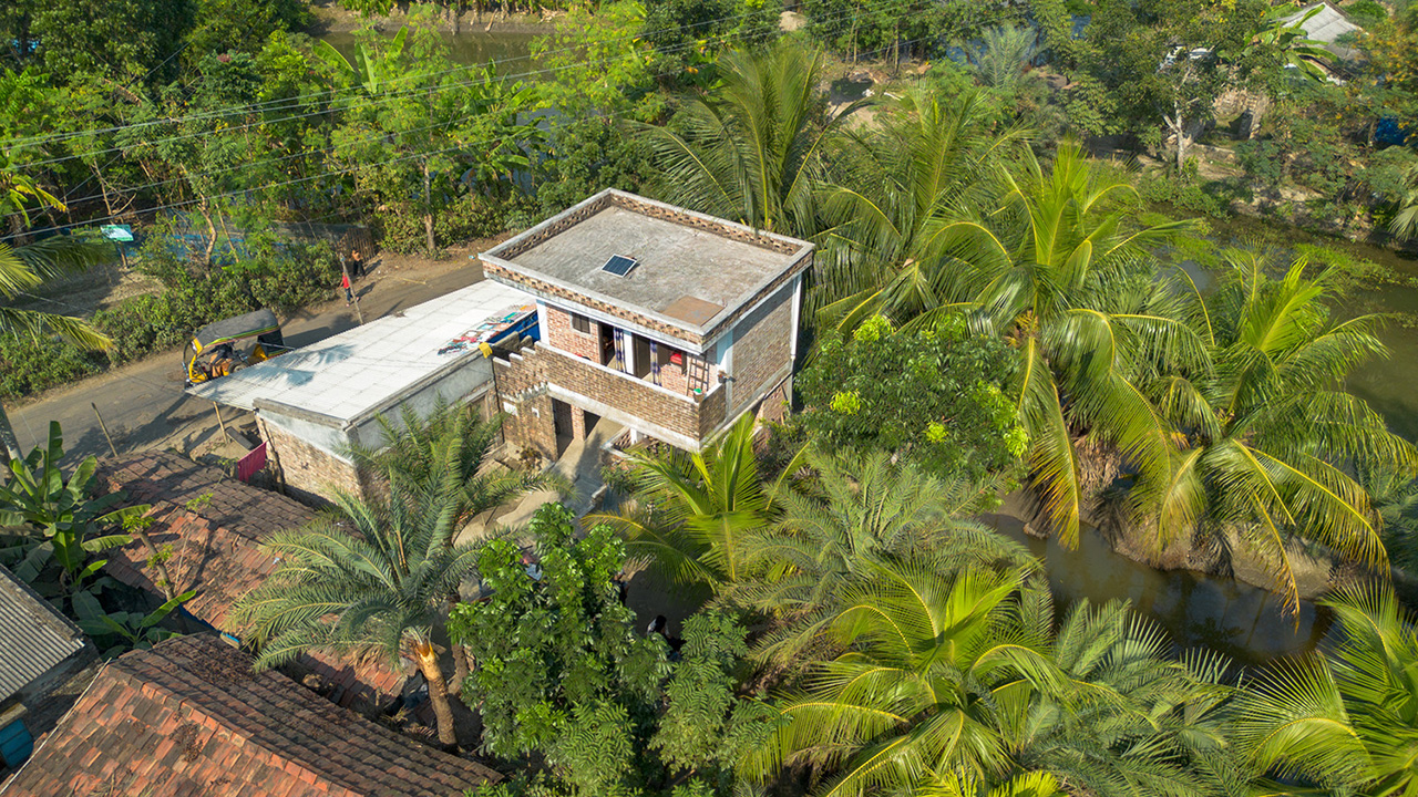 A photo of a climate resilient home in Bangladesh