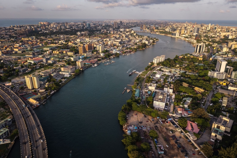 An aerial view of a city with a river wending through it&nbsp;