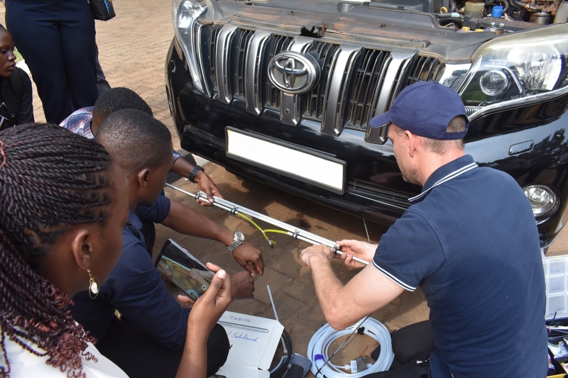 Members of Makerere University undergoing training by Airyx and installation team on the instrument installation on the car.