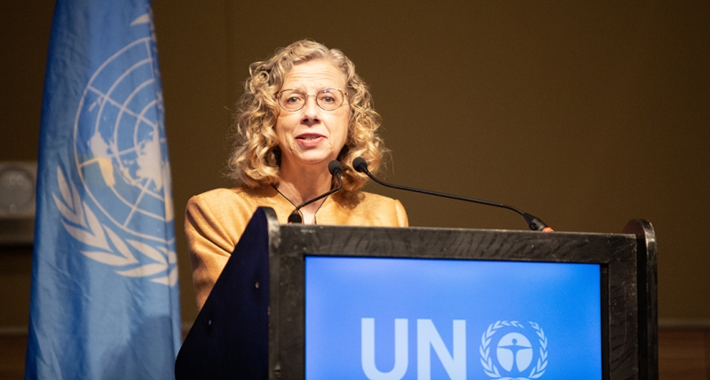 Inger Andersen speaking at a lectrurn