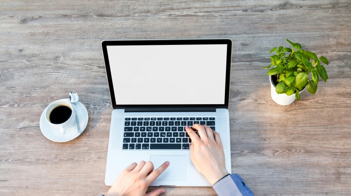 Person's Hand on Laptop