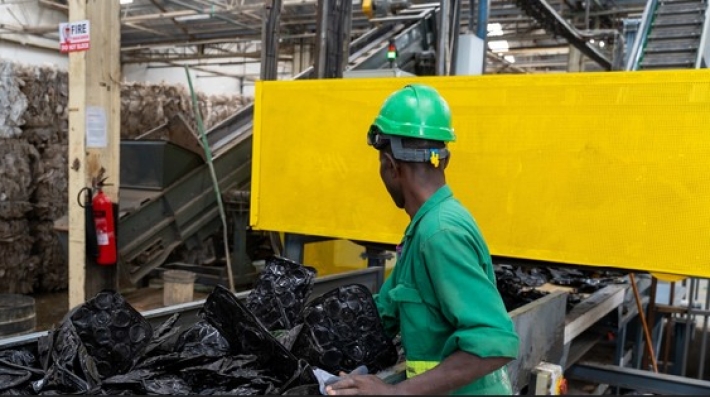 Man sorting out scrap metals