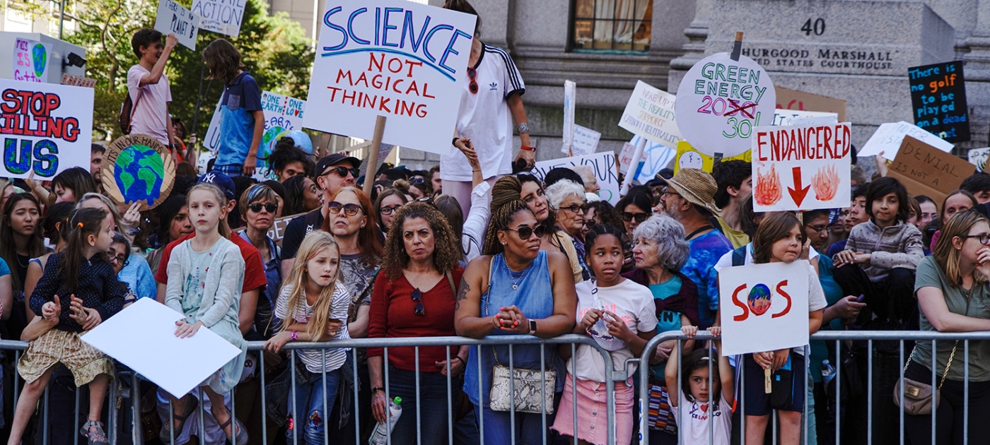 Shifting the burden of environmental degradation: Youth for climate Photo by Katie Rodriguez/ Unsplash