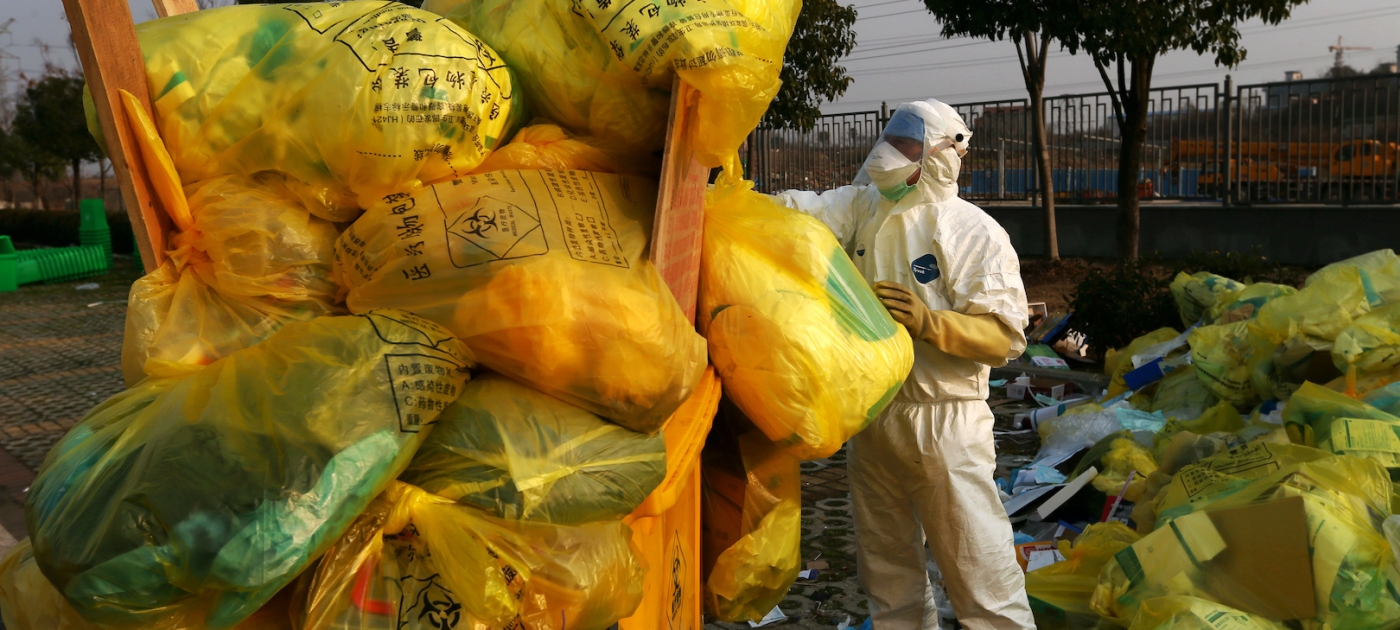 Man cleaning up trash