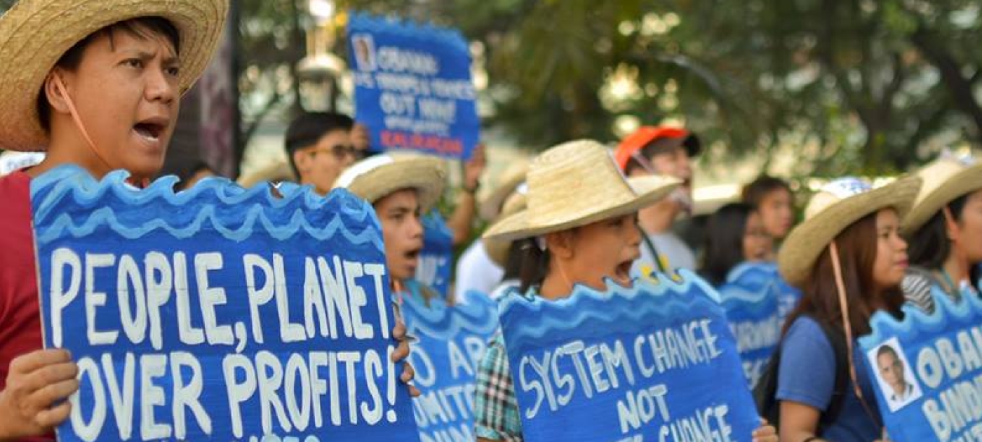 Climate activists protesting against the environmental practices of some foreign companies.