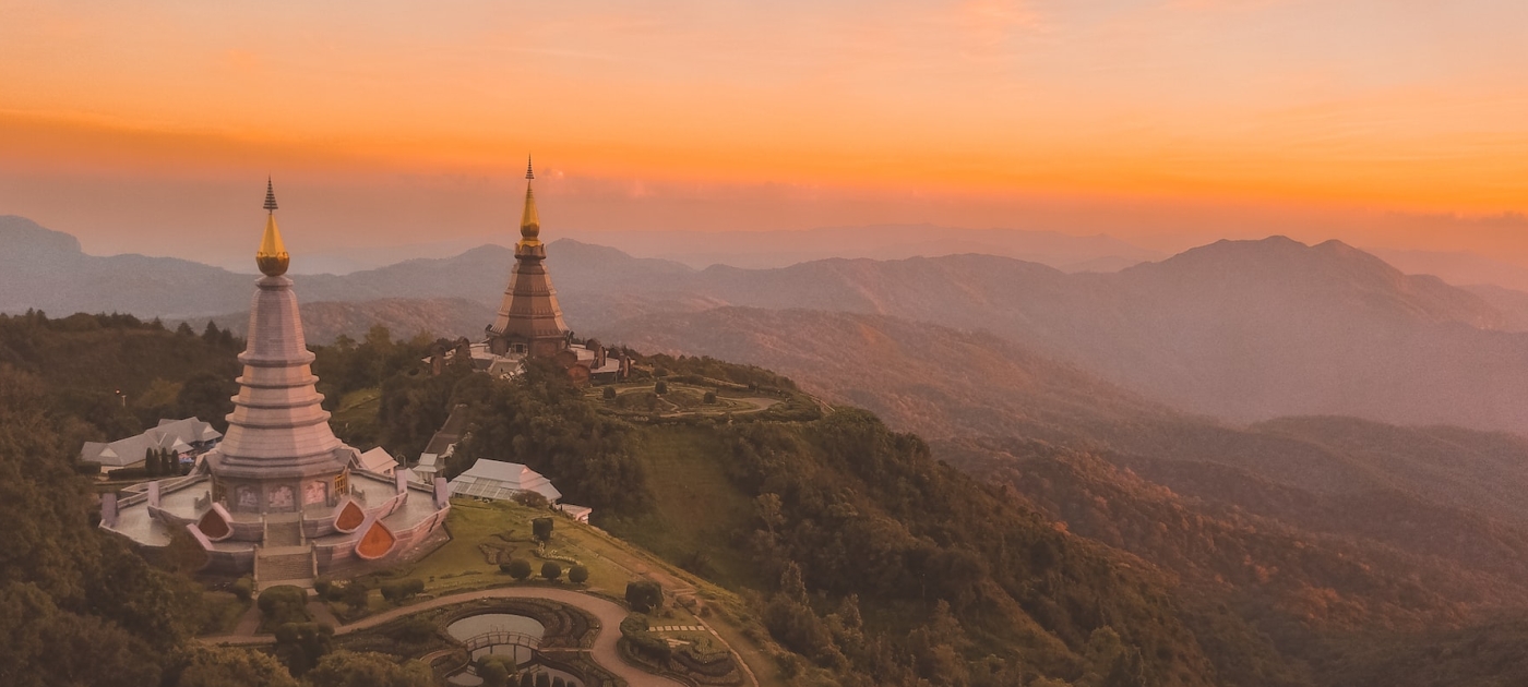 Bird's-eye view of white temple surround by trees, Thailand
