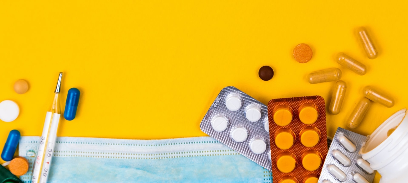 Pills on a yellow background