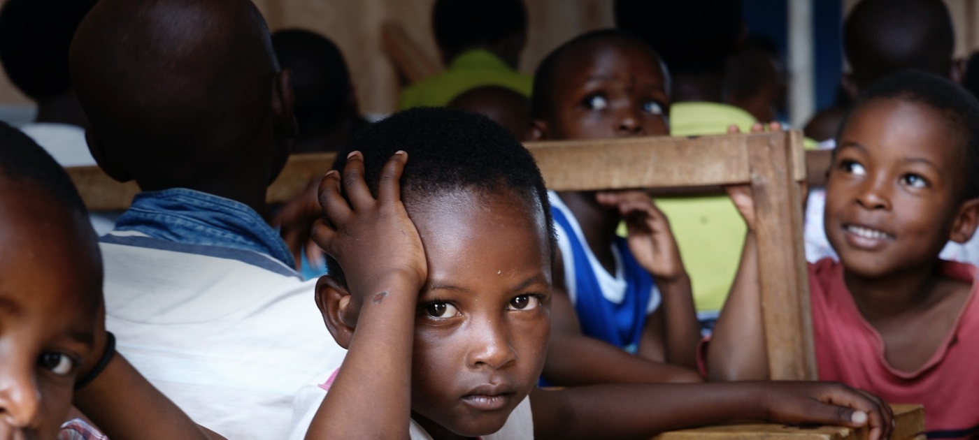 Ugandan student finding it too hard to study. This was taken at a GODLOVESKIDS.com location in Nakasaki (nuh kasa kee) school district. Kampala, Uganda