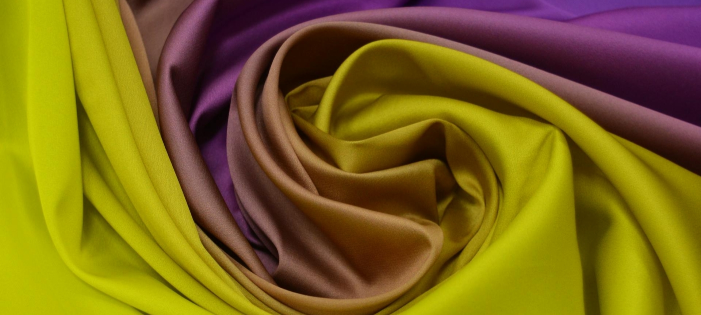 Photo of colorful fabric with wrinkles