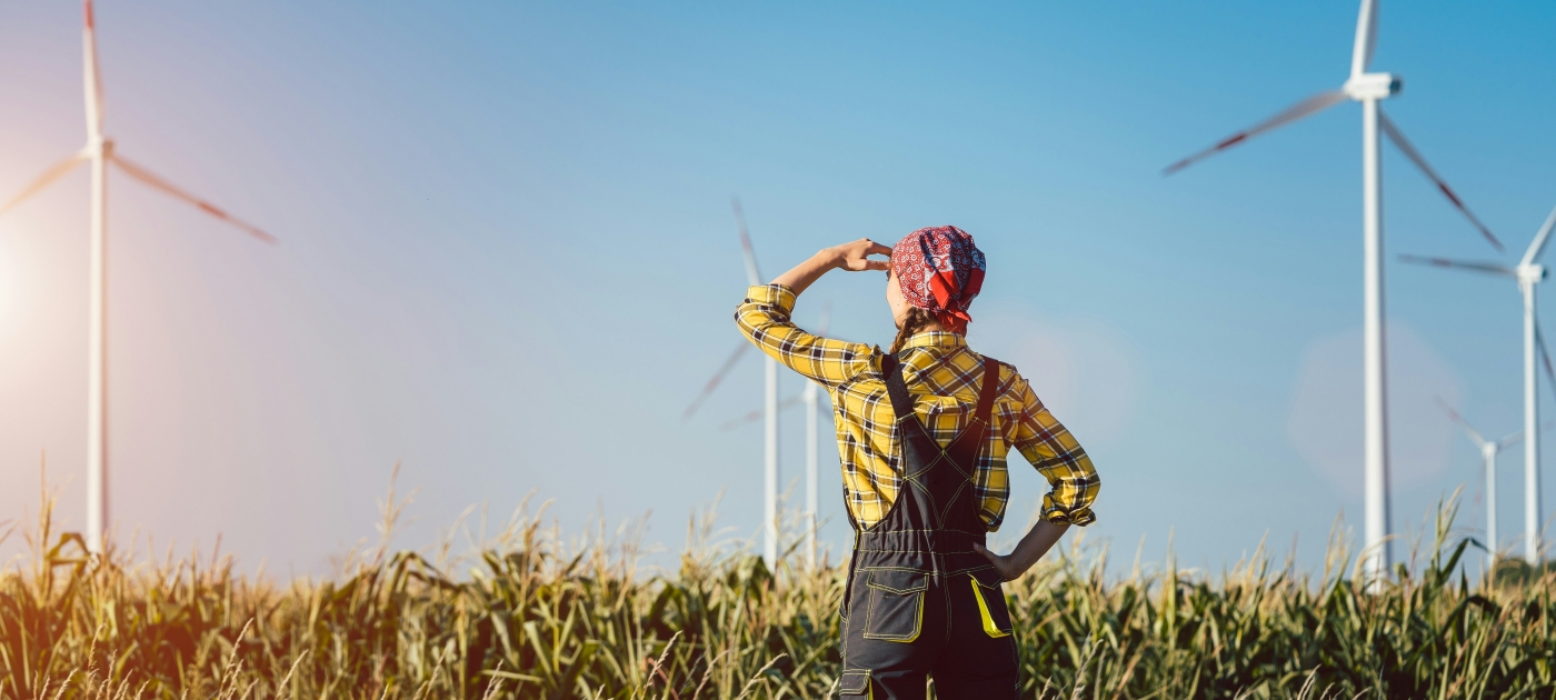 Woman looking at turbines 