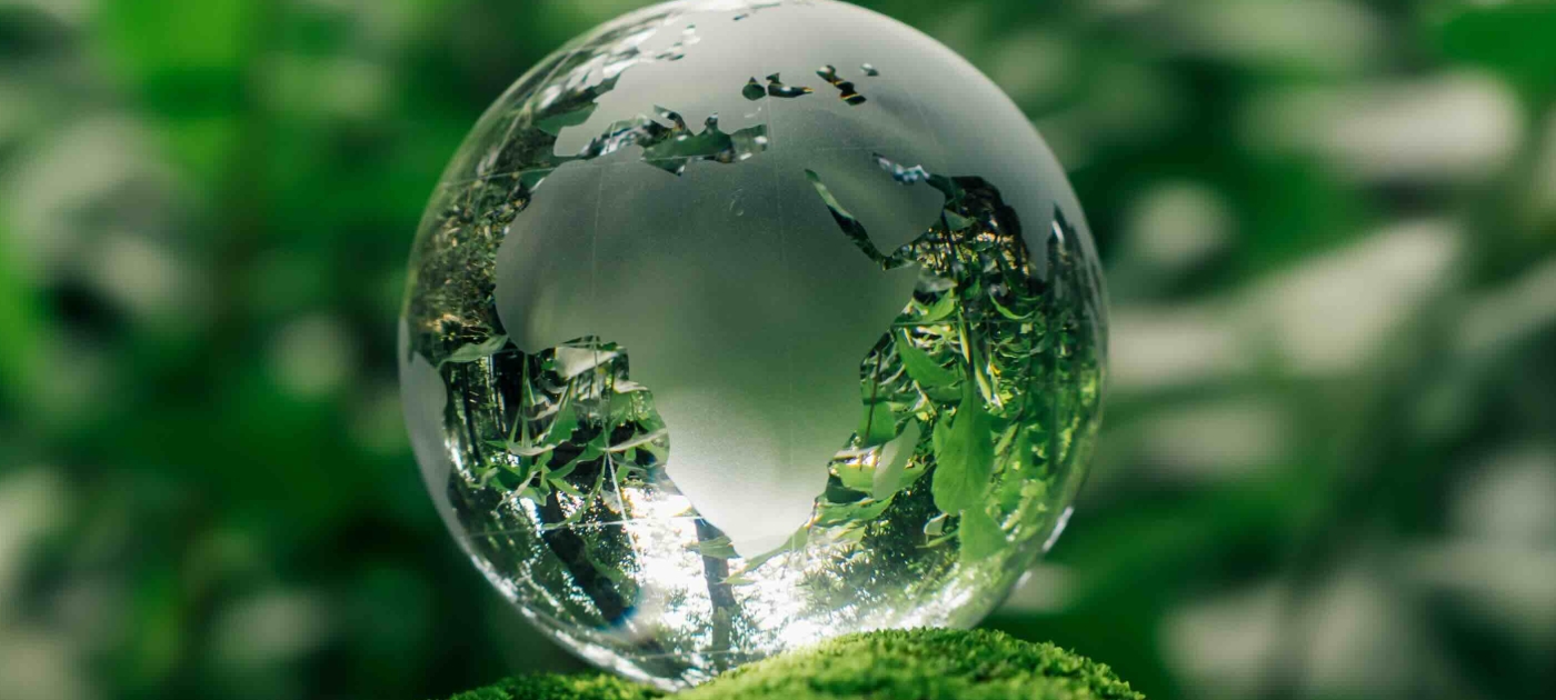 Crystal Globe Symbolizing Environmental Awareness and Conservation