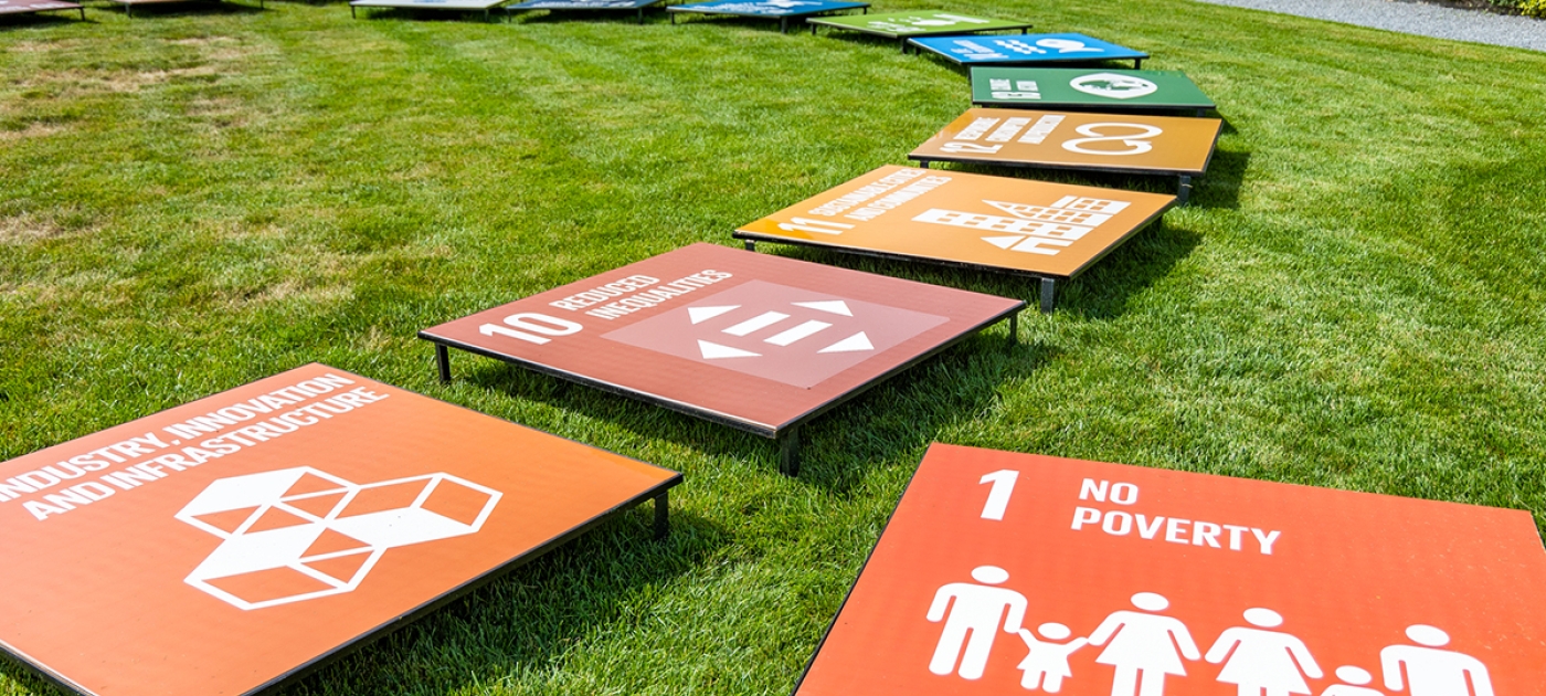 Sustainable Development Goals boards on a lawn