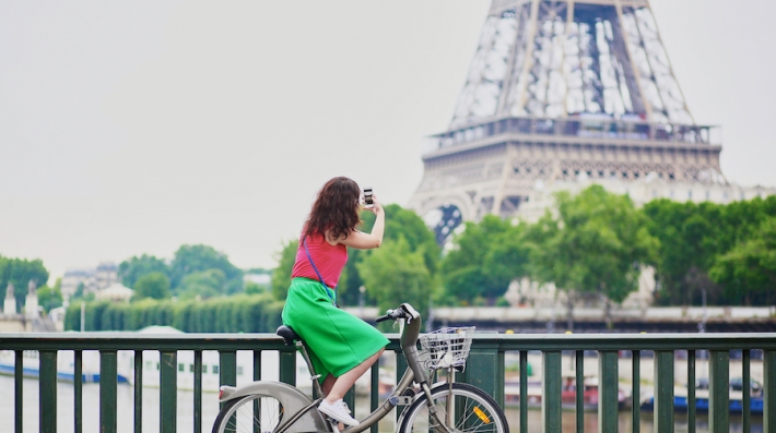 A woman on a bicycle in Paris 