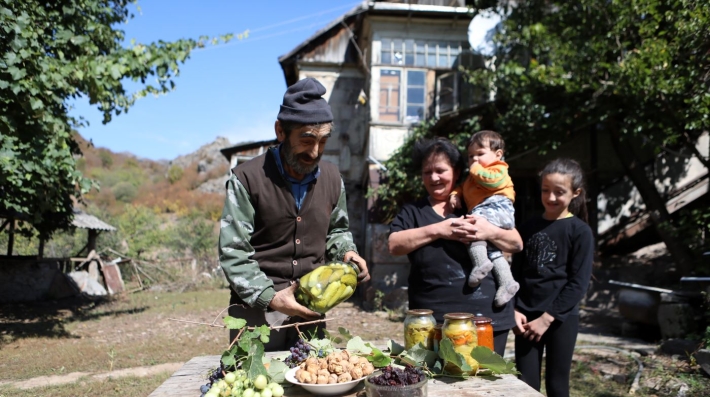 A family in Armenia displays its produce