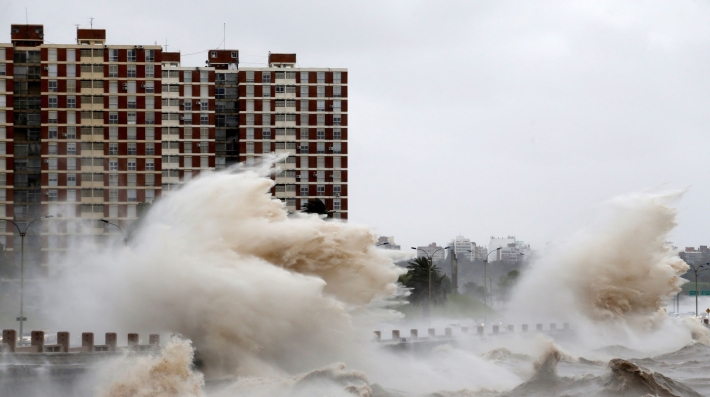 A wave hits the shoreline