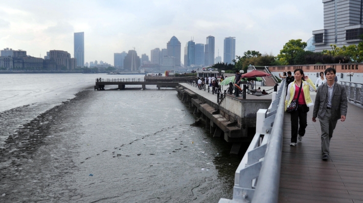 People walk on a bridge