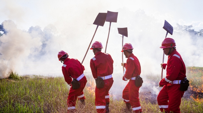 Firefighters putting out a fire