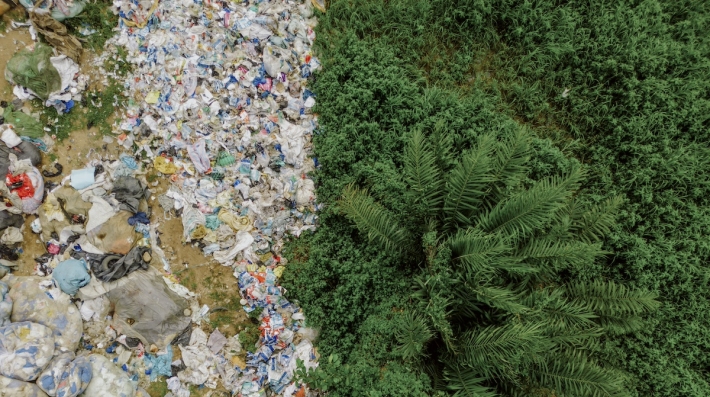 A landfill next to grassland