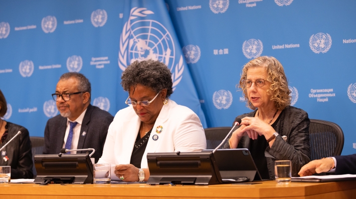 Inger Andersen and others leaders speaking at a podium