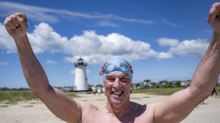 Lewis Pugh finishes his shark swim