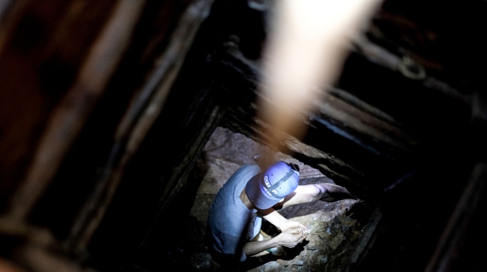 A person in a mine shaft
