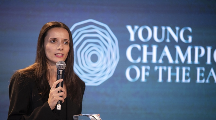 A woman giving a speech