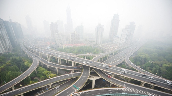 An aerial view of a polluted city
