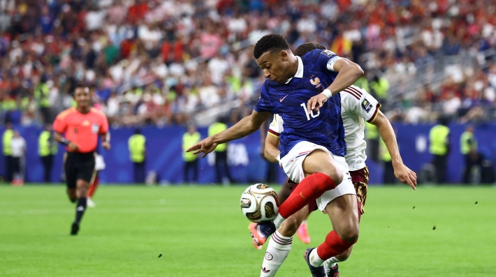 France's forward Kylian Mbappe controls the ball during the 2026 World Cup football tournament semi-final match between France and Spain at the Dallas Stadium in Arlington on July 14, 2026.