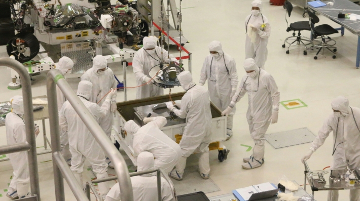 men in white gi in industrial setting