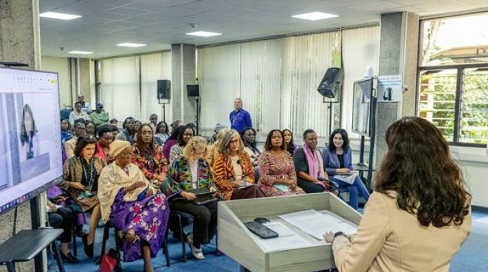 address a group of women
